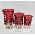 red colored large glass candlestick holder